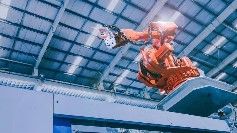 Technology And Industry 4.0 Revolution Concept From High Precision Robotic System